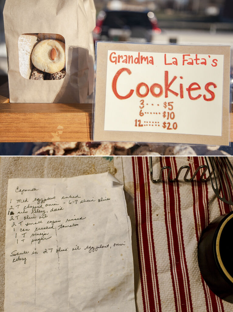 Top: A sign saying “Grandma La Fata’s Cookies” is bathed in morning light at Pasta La Fata’s booth